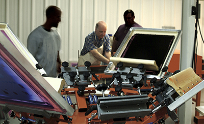 Greg Rutherford teaches screenprinting at Exclusive Custom Screenprinting